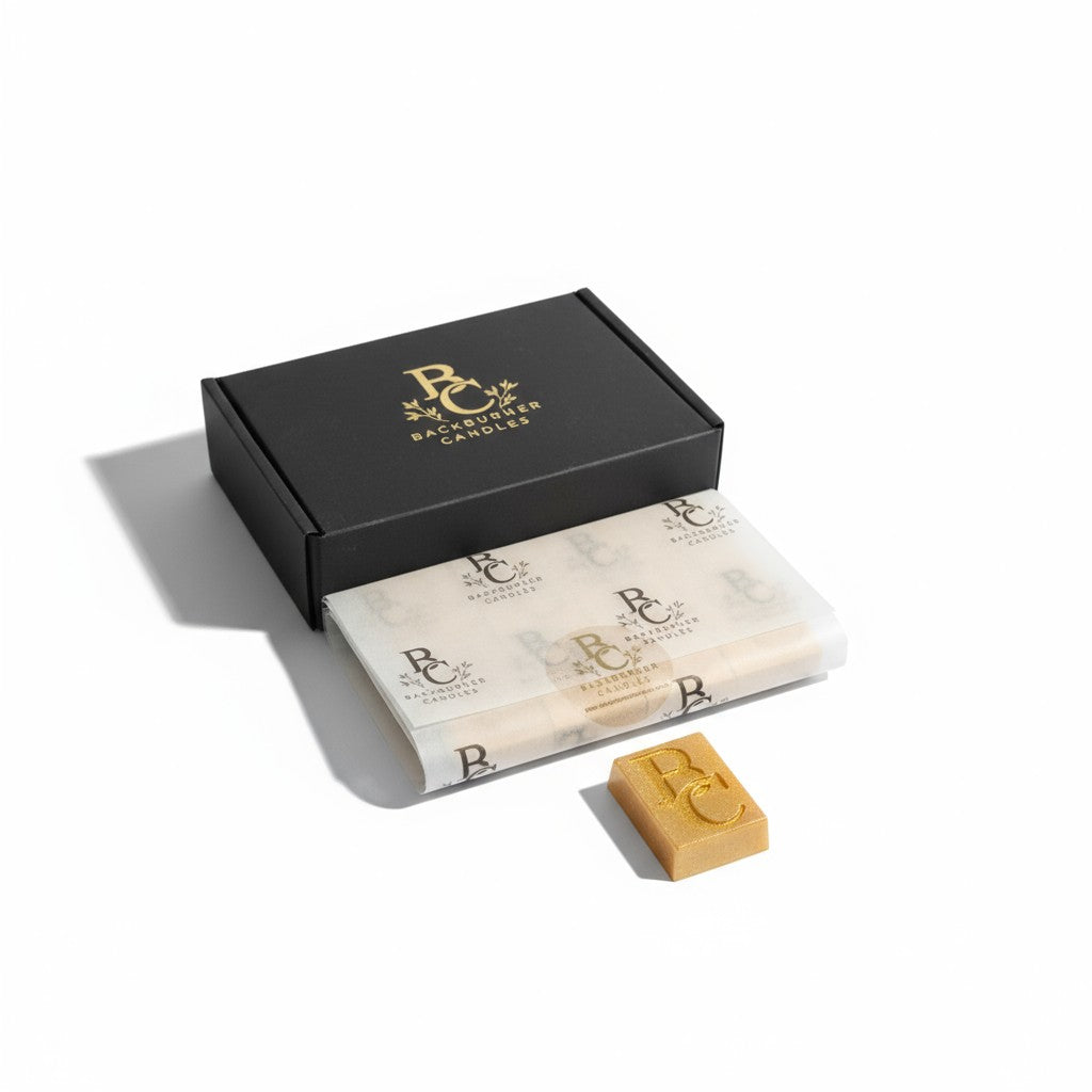 Backburner Candles wax melt gift box with vegan melt and branded wrap in elegant black and gold