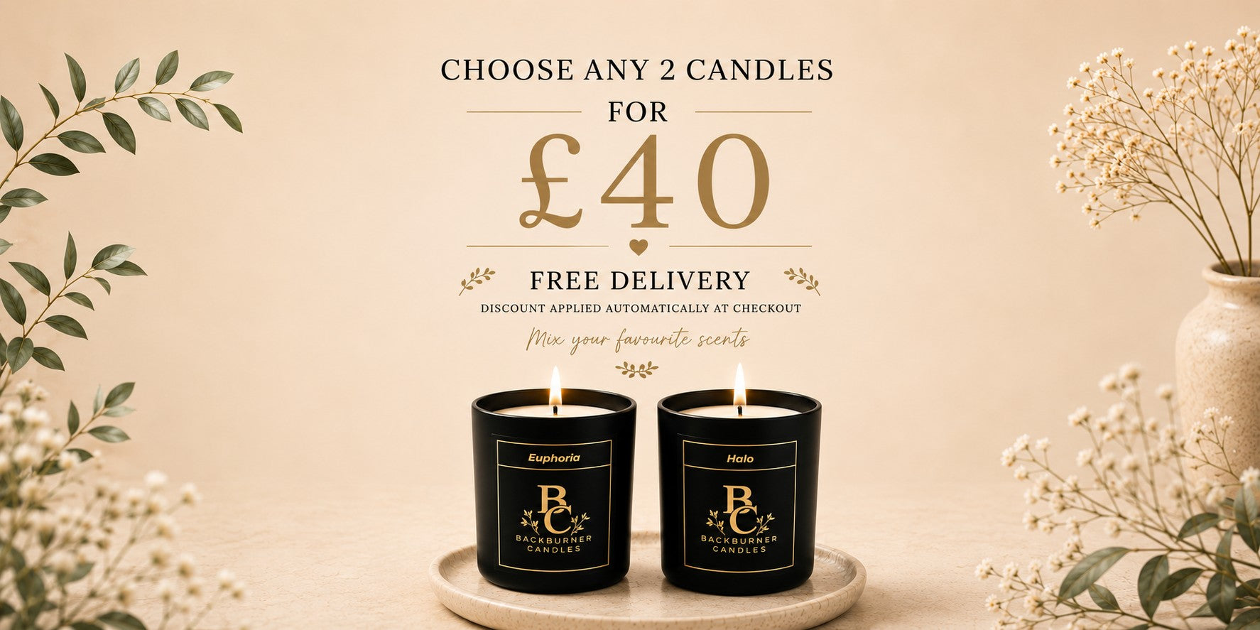 Two black candles on a wooden tray with decorative elements and promotional text on a beige background.