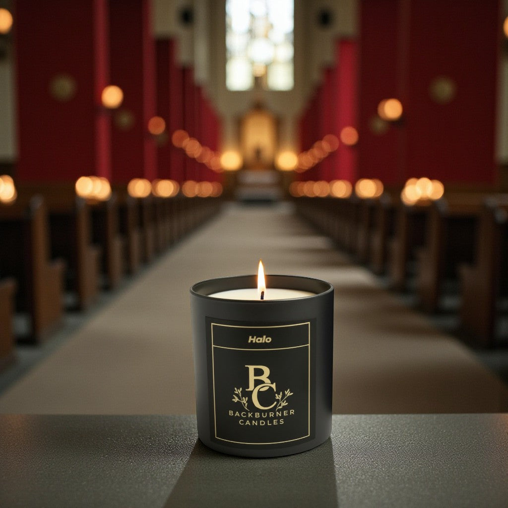 Halo Backburner Candles candle on a table with a blurred church interior background