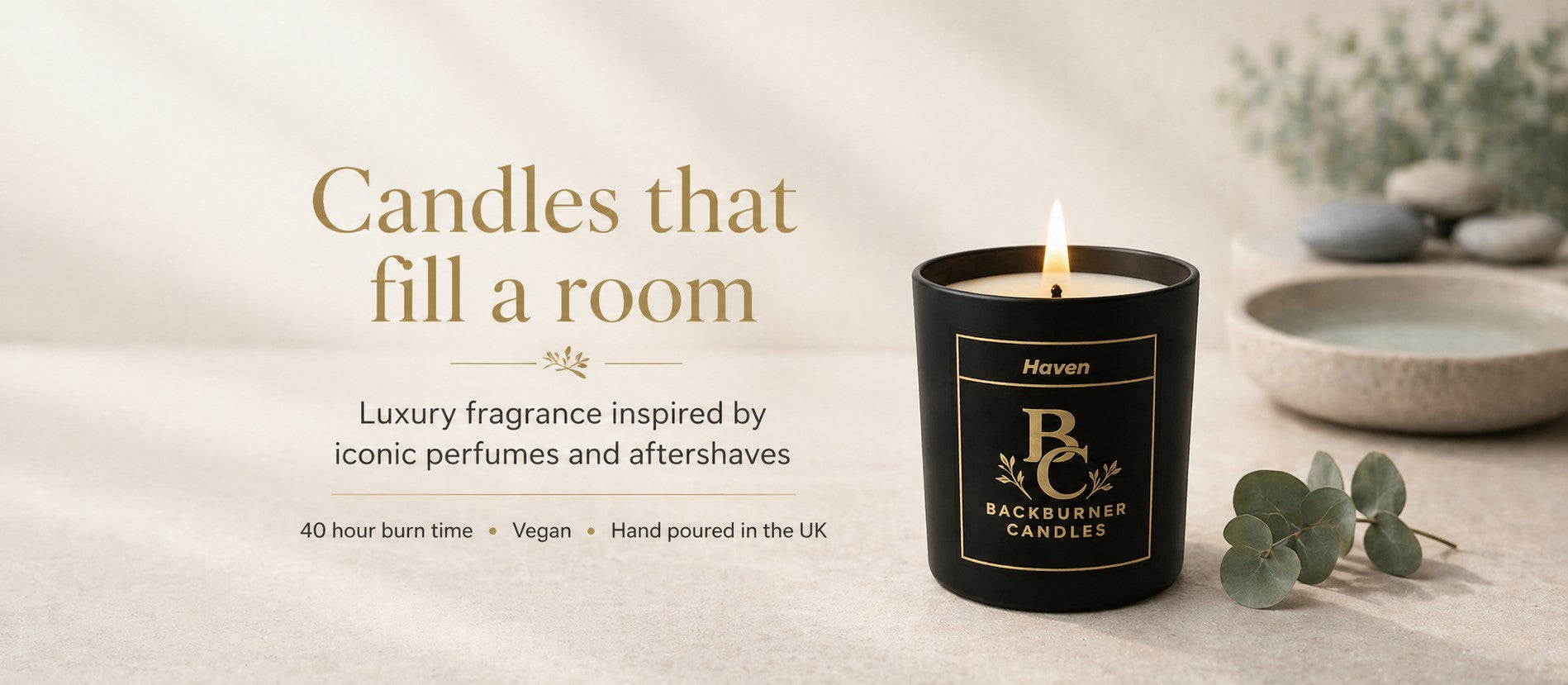 Haven candle from Backburner Candles with foilage and a bowl.