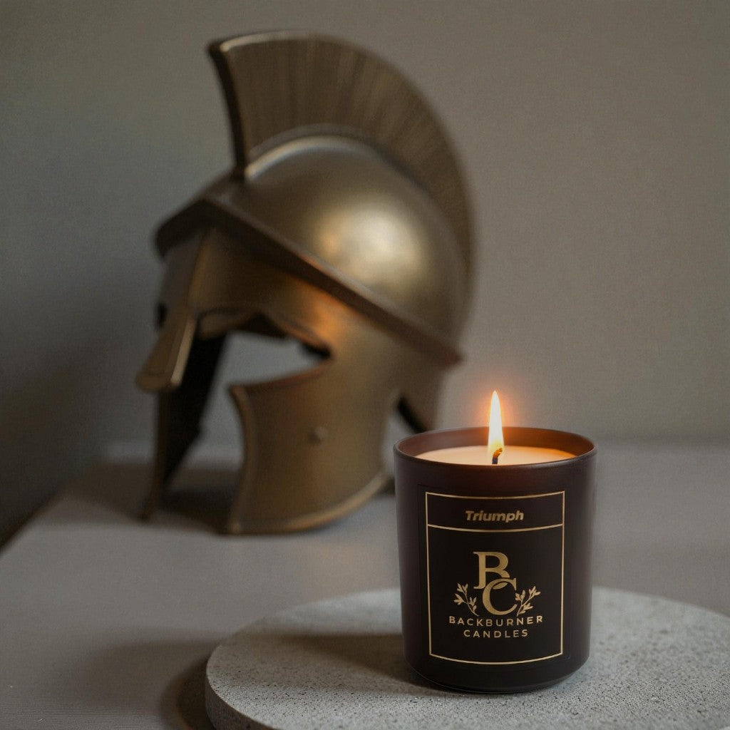 Triumph candle from Backburner Candles with gladiator helmet in background